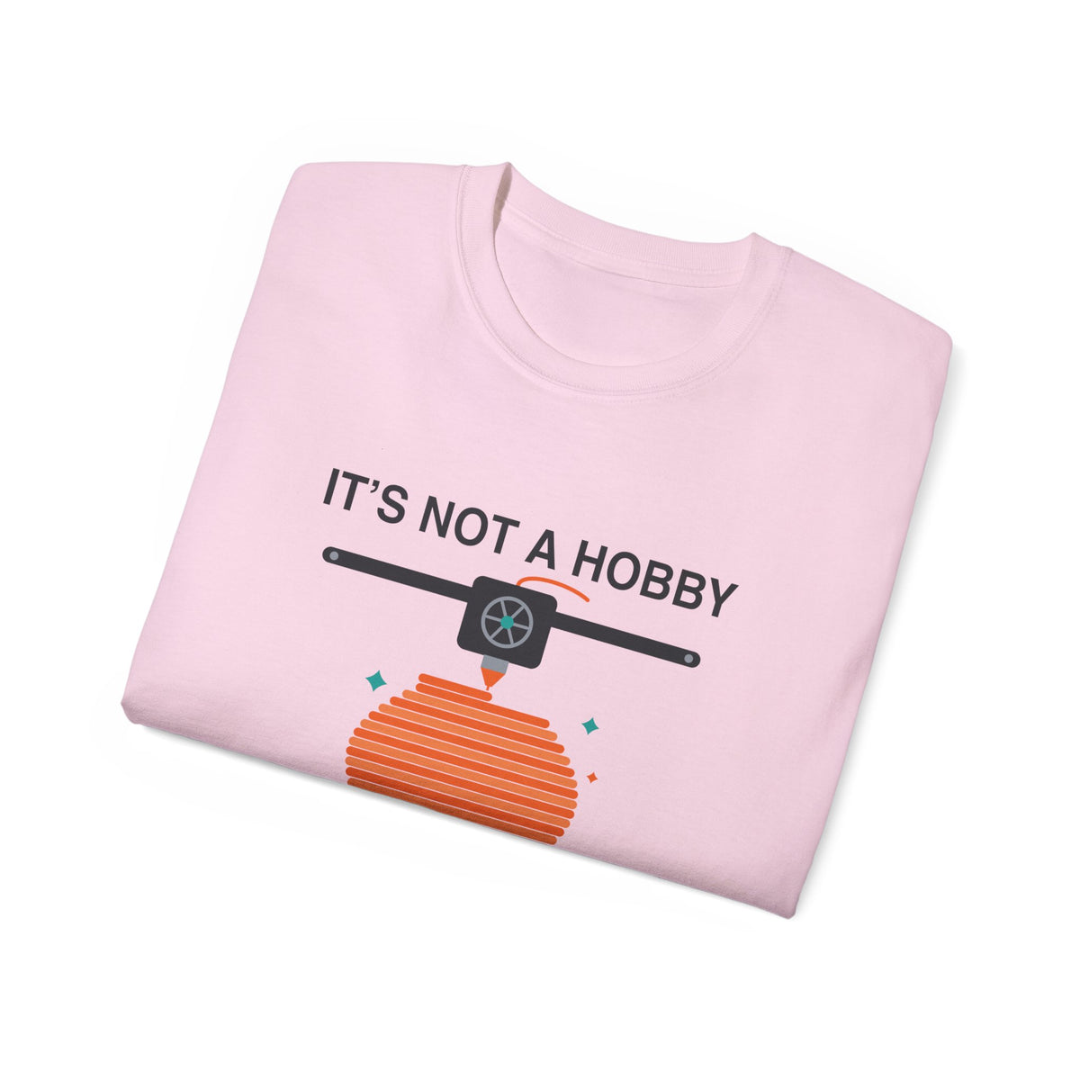 It's a Print Queue 3D printing graphic t-shirt by TeePara, folded and worn by a model