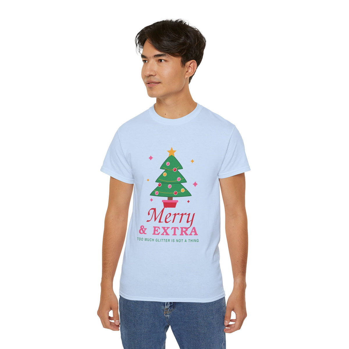 Merry and Extra whimsical Christmas graphic t-shirt by TeePara, folded and worn by a model