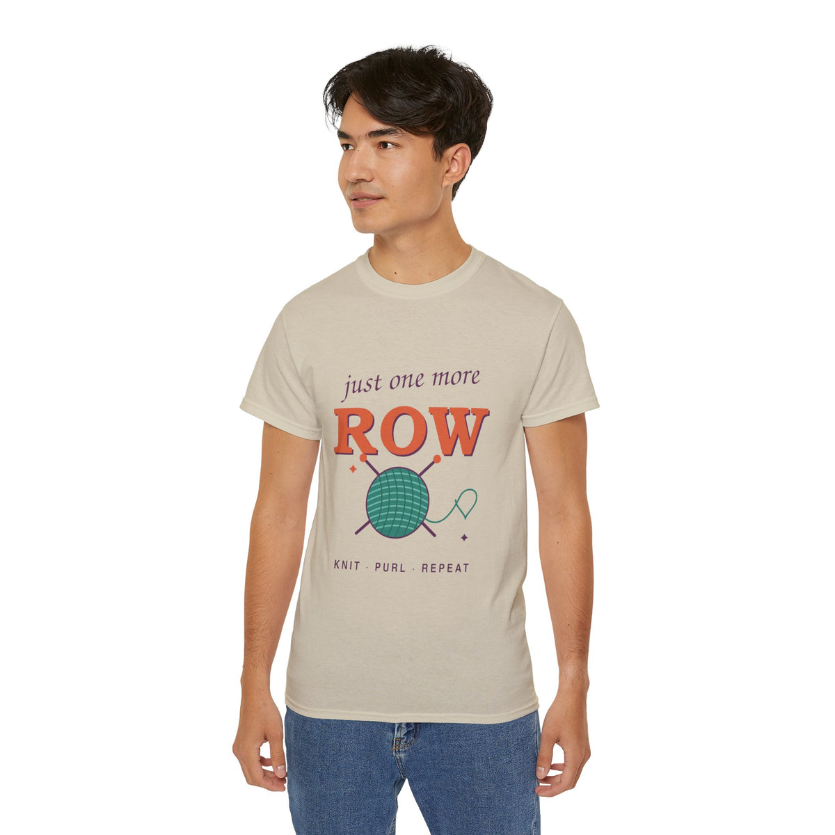 Just One More Row knitting and crochet graphic t-shirt by TeePara, folded and worn by a model