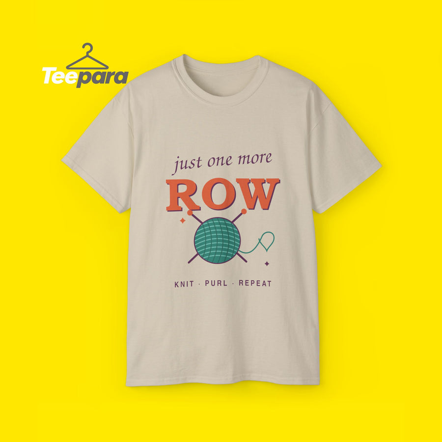 Just One More Row knitting t-shirt with yarn ball and needles, front view on TeePara yellow background