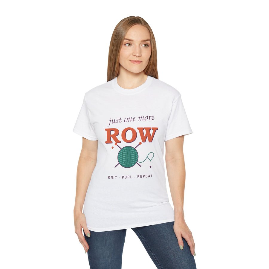 Just One More Row knitting and crochet graphic t-shirt by TeePara, folded and worn by a model