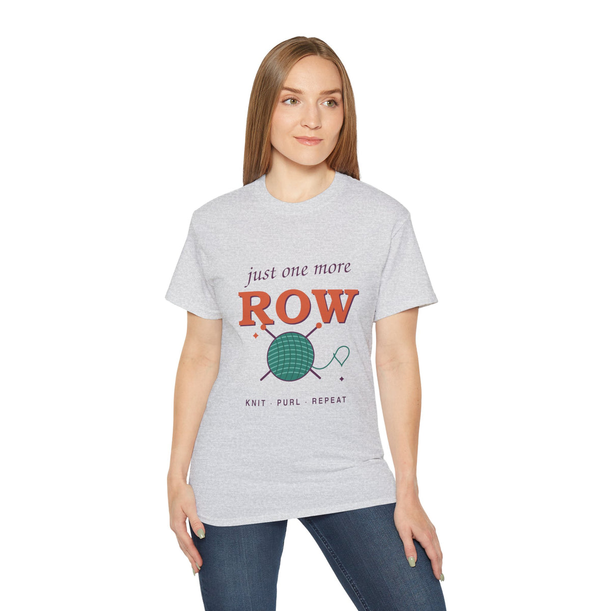 Just One More Row knitting and crochet graphic t-shirt by TeePara, folded and worn by a model