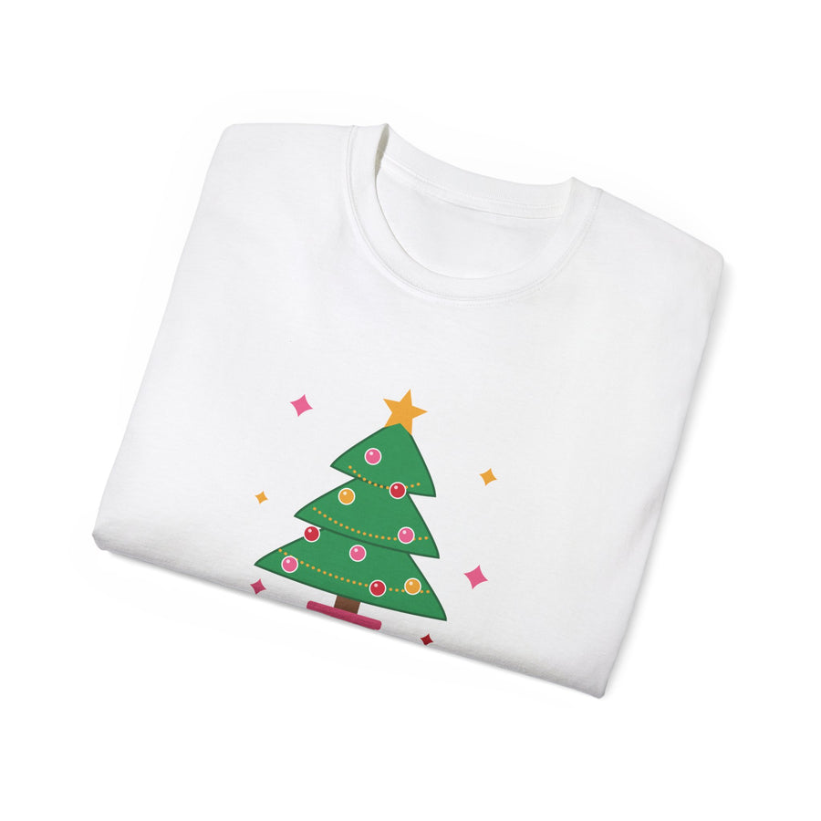 Merry and Extra whimsical Christmas graphic t-shirt by TeePara, folded and worn by a model