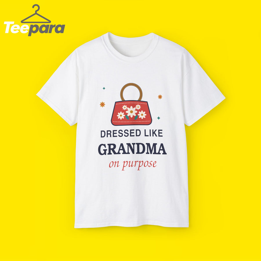 White unisex t-shirt with a floral embroidered handbag with a wooden ring handle and the text Dressed Like Grandma On Purpose