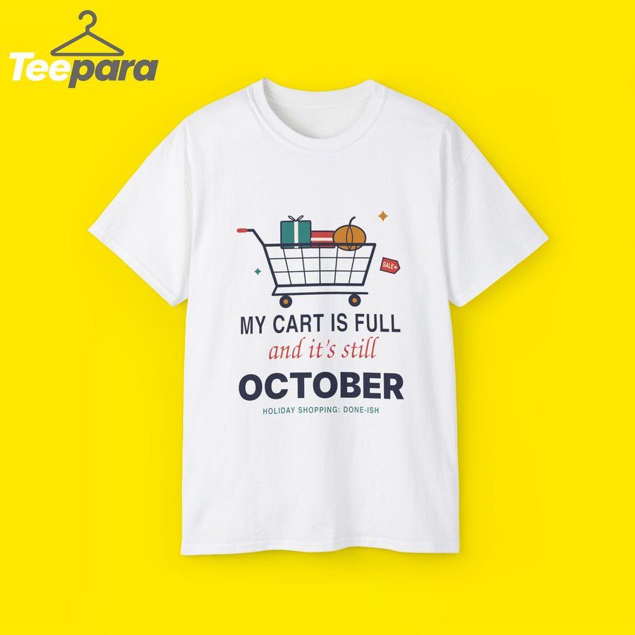 White unisex t-shirt with a shopping cart full of gifts and a pumpkin and the text My Cart Is Full And It's Still October