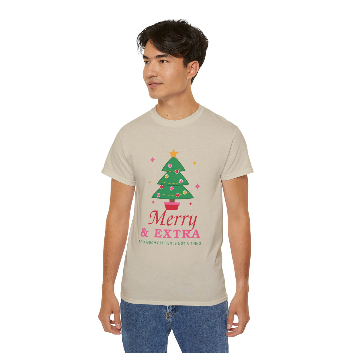Merry and Extra whimsical Christmas graphic t-shirt by TeePara, folded and worn by a model